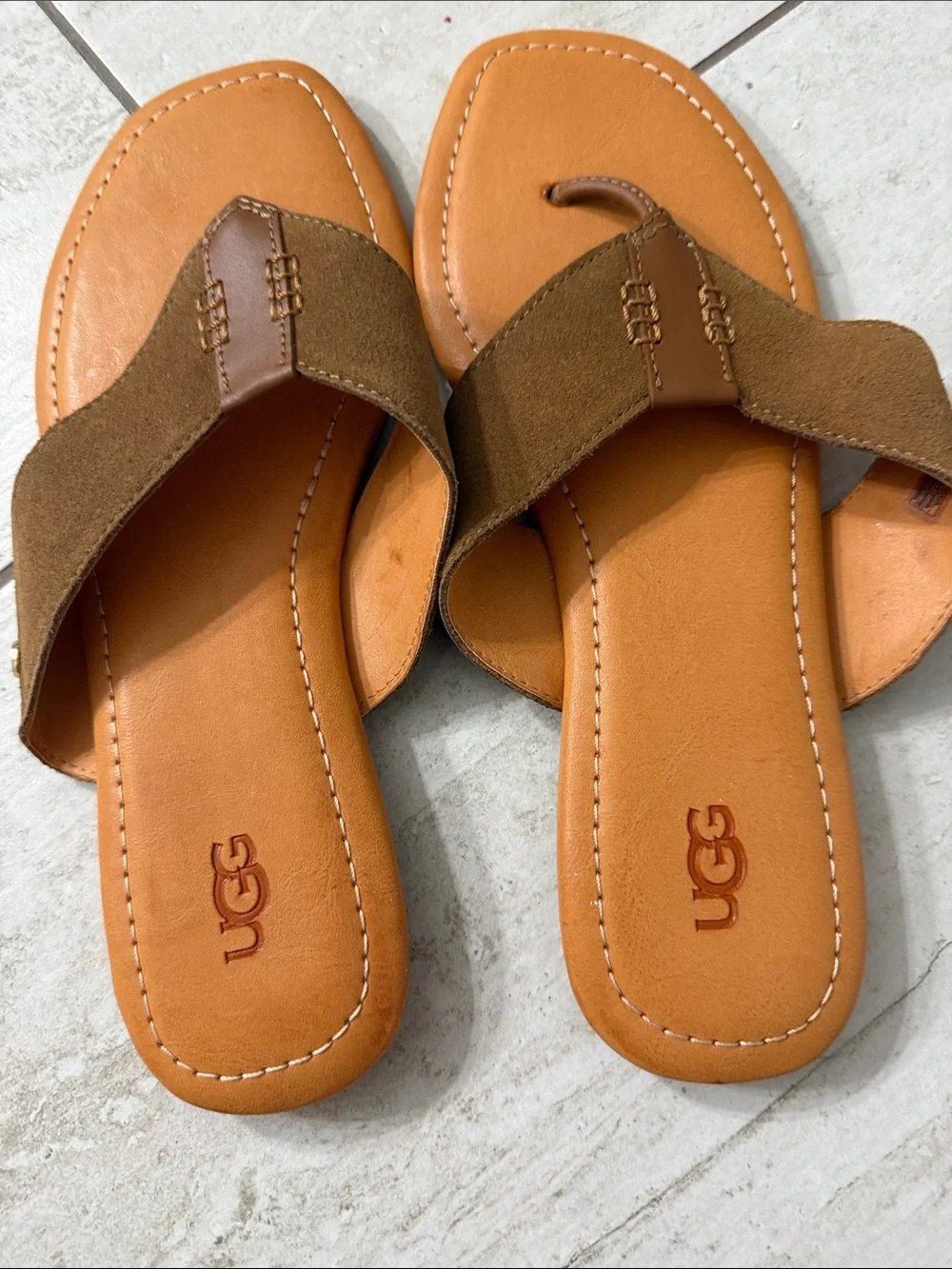UGG Women’s Tan and Brown Suede Thong Sandals..size 9 ..gold button logo